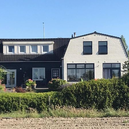 T Huuske Tuinappartement Met Fantastisch Uitzicht, Nabij Zee Zonnemaire Екстериор снимка