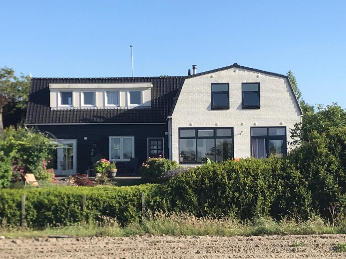 T Huuske Tuinappartement Met Fantastisch Uitzicht, Nabij Zee Zonnemaire Екстериор снимка