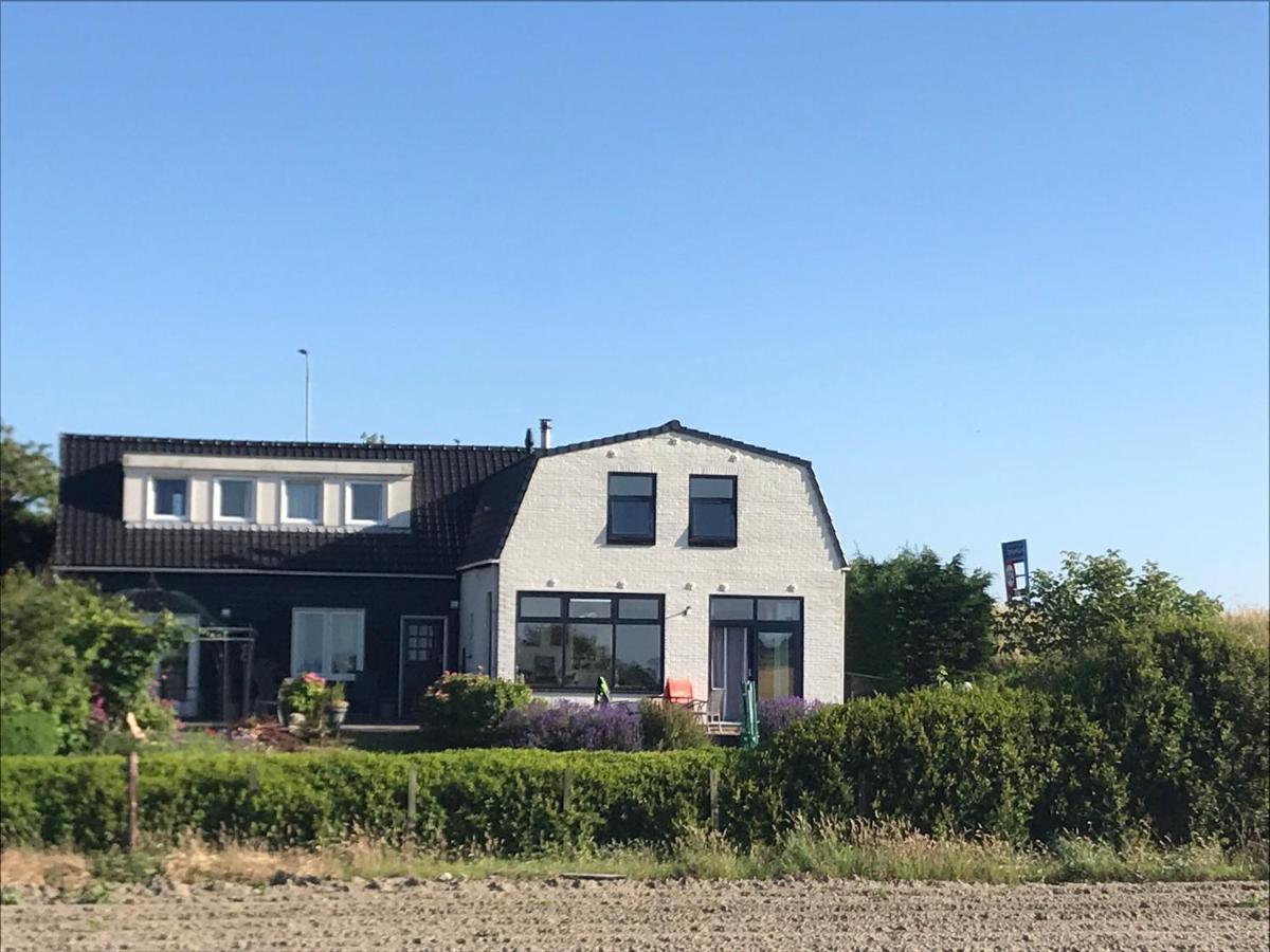T Huuske Tuinappartement Met Fantastisch Uitzicht, Nabij Zee Zonnemaire Екстериор снимка